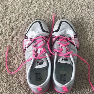 Grey and pink nike running shoes.